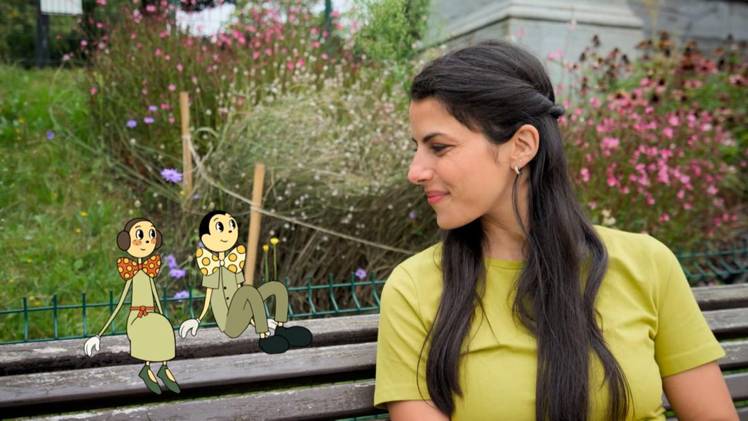 Moderatorin Clarissa Correa da Silva aus der "Sendung mit der Maus" mit den Zeichentrickfiguren Pit und Peggs